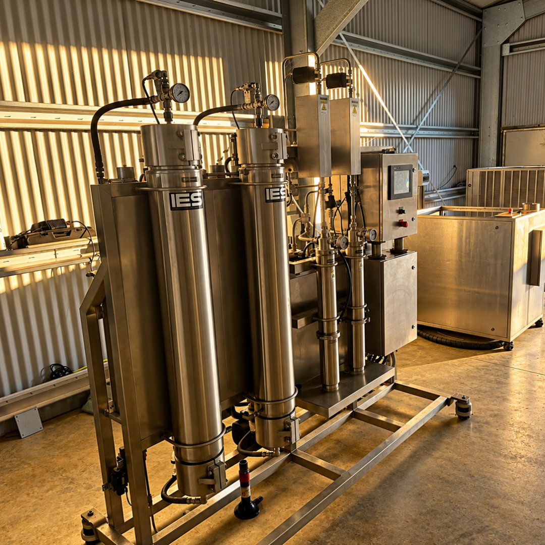 Stainless steel CO2 extraction equipment inside a boronia processing shed